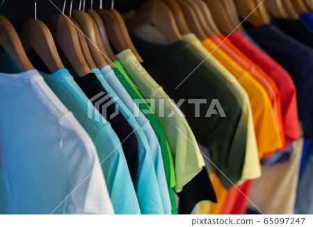 Men clothes in modern garments shop Men clothes in modern garments shop 65097247