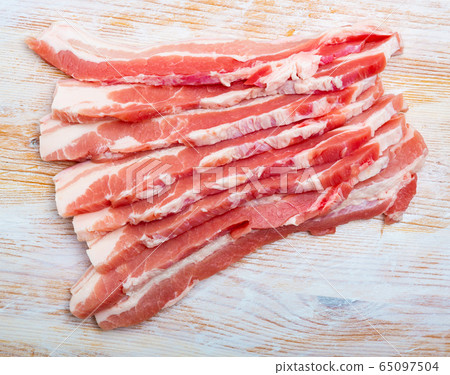 Raw bacon steak Raw bacon steak 65097504