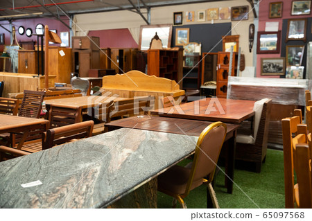 Tables in furniture shop Tables in furniture shop 65097568