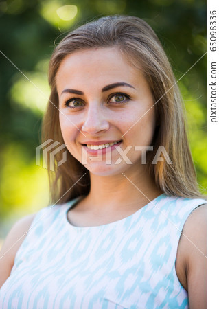 portrait of cheerful young woman portrait in outdoor portrait of cheerful young woman portrait in outdoor 65098336