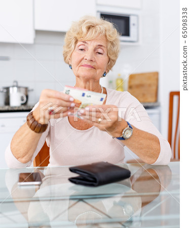 Portrait of cheerful elderly woman Portrait of cheerful elderly woman 65098338