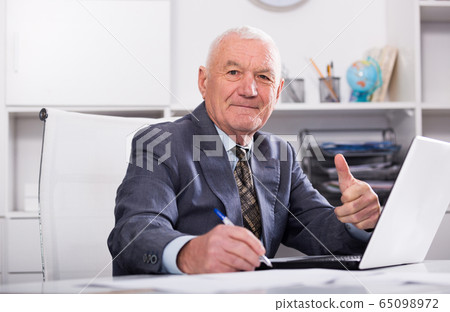Man working productively 65098972