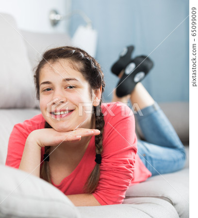 Girl posing playfully 65099009