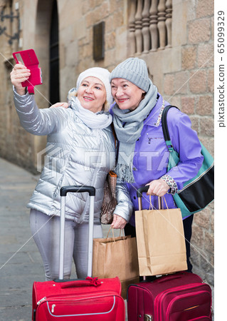Senior ladies making selfie outdoors 65099329