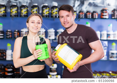 Modern people discussing in shop interior Modern people discussing in shop interior 65100098
