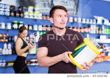 guy looking for necessary food supplements guy looking for necessary food supplements 65100290