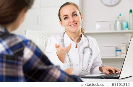 Female doctor and female patient 65101213
