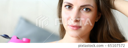Beautiful girl holds sports water bottle, training Beautiful girl holds sports water bottle, training 65107572