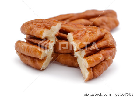 Pecan nut isolated on white 65107595