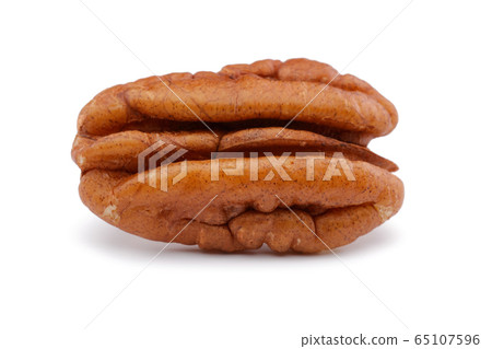 Pecan nut isolated on white Pecan nut isolated on white 65107596