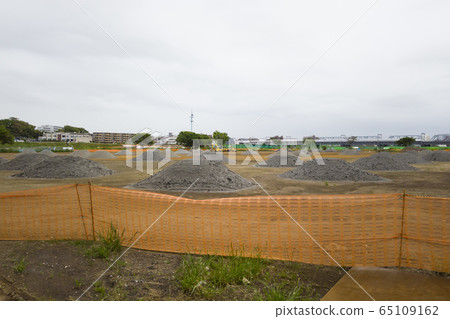 Riverbed repair work site after a disaster Riverbed repair work site after a disaster 65109162
