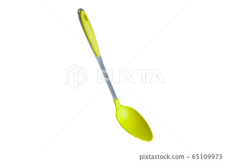 Green spoon on a white background Green spoon on a white background 65109973