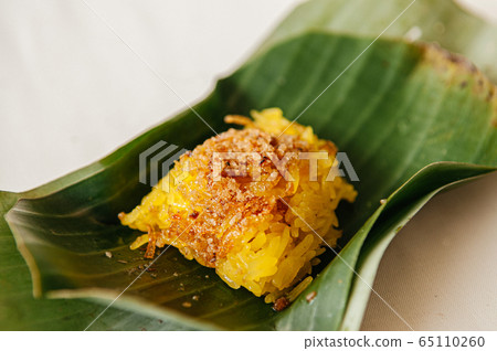 Sweet Shrimp and shred coconut on yellow sticky rice Sweet Shrimp and shred coconut on yellow sticky rice 65110260