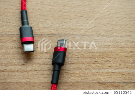 The usb type c is a hi speed data transfer and quick or fast charge battery.It a new connector port fo a computer , laptop, or cell phone.A red cable plug to notebook. The usb type c is a hi speed data transfer and quick or fast charge battery.It a new connector port fo a computer , laptop, or cell phone.A red cable plug to notebook. 65110545