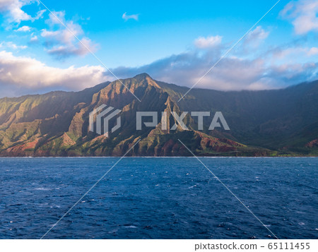 Green cliffs and coves of the Na Pali Coast on Kauai, Hawaii Green cliffs and coves of the Na Pali Coast on Kauai, Hawaii 65111455