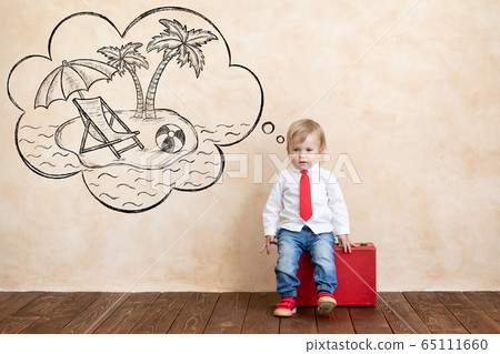 Happy child wish to travel 65111660