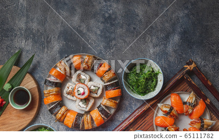 Sushi and rolls sets. Japonese food. top view 65111782