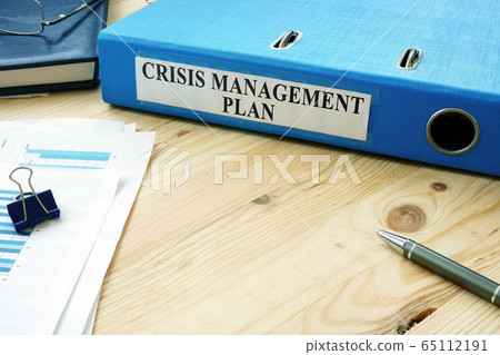 Big folder with label Crisis Management Plan Big folder with label Crisis Management Plan 65112191