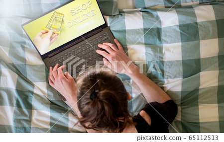 online shopping woman with laptop online shopping woman with laptop 65112513