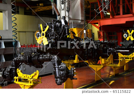 New engines on assembly line of industrial factory. New engines on assembly line of industrial factory. 65115822