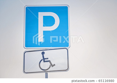 Car parking sign for people with disabilities. 65116980