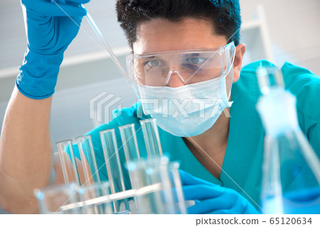 Medical scientist working in laboratory Medical scientist working in laboratory 65120634