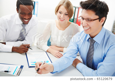 Business people working together. 65120679