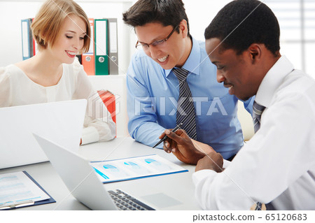 Business people working together. 65120683