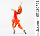 Woman modern dancer wearing red dress 65120721
