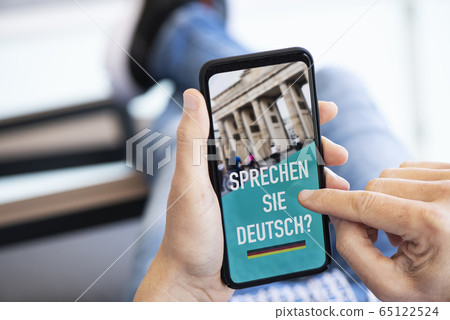 text do you speak German in German in a smartphone text do you speak German in German in a smartphone 65122524
