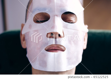 man wearing a facial mask man wearing a facial mask 65122525