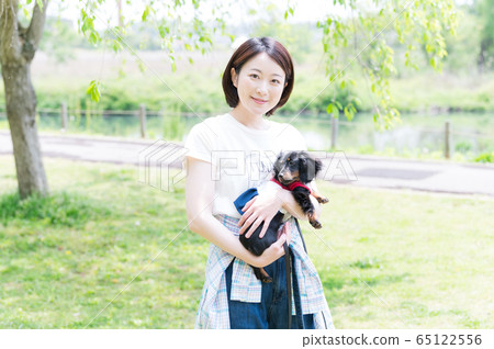 Dog walk woman Dog walk woman 65122556
