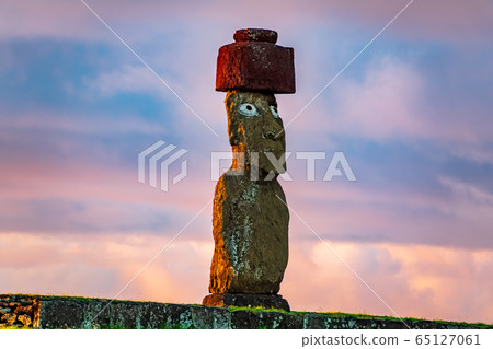 Isolated moai with tail light at dusk 65127061