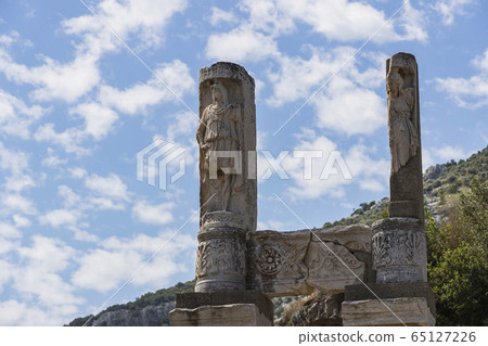 The ruins of the ancient antique city of Ephesus the library building of Celsus, the amphitheater temples and columns. Candidate for the UNESCO World Heritage List The ruins of the ancient antique city of Ephesus the library building of Celsus, the amphitheater temples and columns. Candidate for the UNESCO World Heritage List 65127226