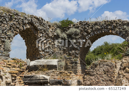 The ruins of the ancient antique city of Ephesus the library building of Celsus, the amphitheater temples and columns. Candidate for the UNESCO World Heritage List 65127249