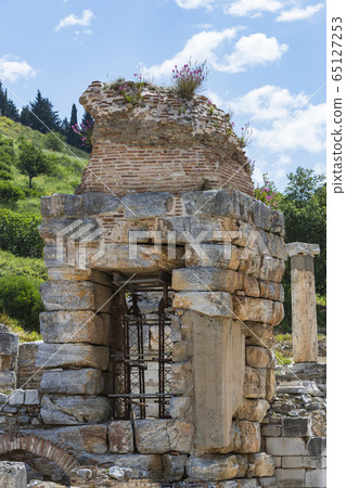 The ruins of the ancient antique city of Ephesus the library building of Celsus, the amphitheater temples and columns. Candidate for the UNESCO World Heritage List The ruins of the ancient antique city of Ephesus the library building of Celsus, the amphitheater temples and columns. Candidate for the UNESCO World Heritage List 65127253