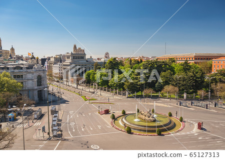 Madrid Spain, city skyline at Independence Square and Cibeles Fountain nobody empty 65127313