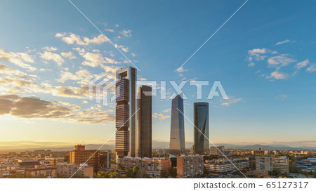 Madrid Spain, sunset city skyline at financial district center with four towers Madrid Spain, sunset city skyline at financial district center with four towers 65127317