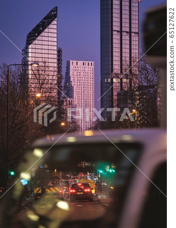 london downtown by night skyscrapers traffic lights 65127622