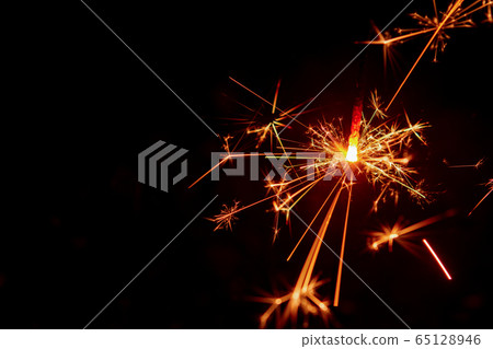 Sparkler background. Christmas and new year Sparkler background. Christmas and new year 65128946