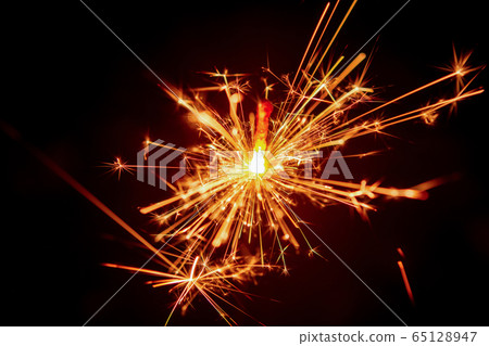 Sparkler background. Christmas and new year Sparkler background. Christmas and new year 65128947