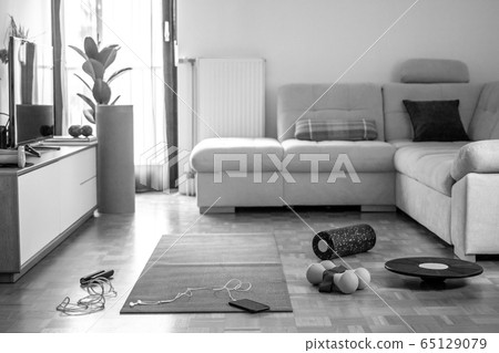 sport equipment in living room exercising space sport equipment in living room exercising space 65129079