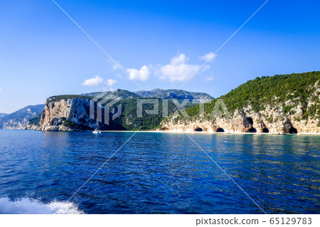 Cala Luna beach in Orosei Golf, Sardinia, Italy 65129783