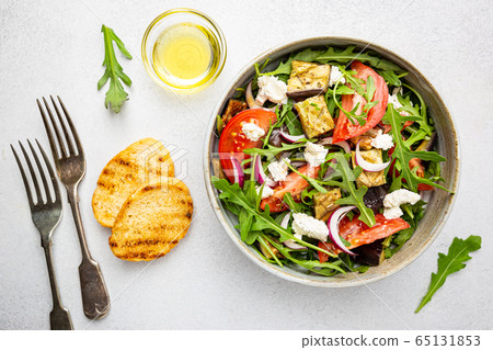 Eggplant salad with tomatoes 65131853