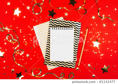 Notebook with page for goals and resolutions 65132477