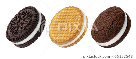 Chocolate sandwich cookies, baked biscuits stuffed with milk cream isolated on white background 65132548