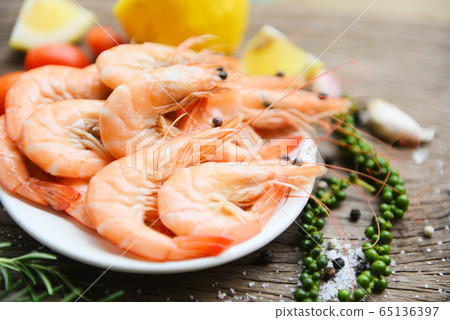 fresh shrimp on white plate with ingredients herb fresh shrimp on white plate with ingredients herb 65136397