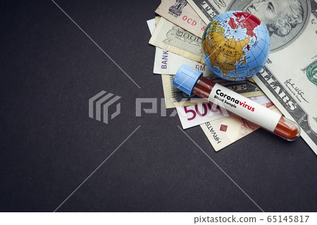 CORONAVIRUS text with currency banknotes 65145817