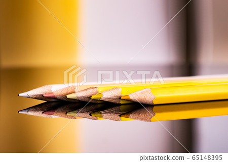 Colorful pencils on a background.  65148395