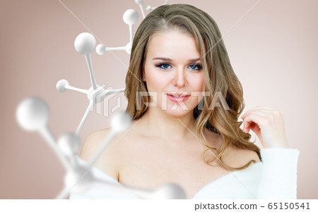 Beautiful woman near big white molecule chain. 65150541